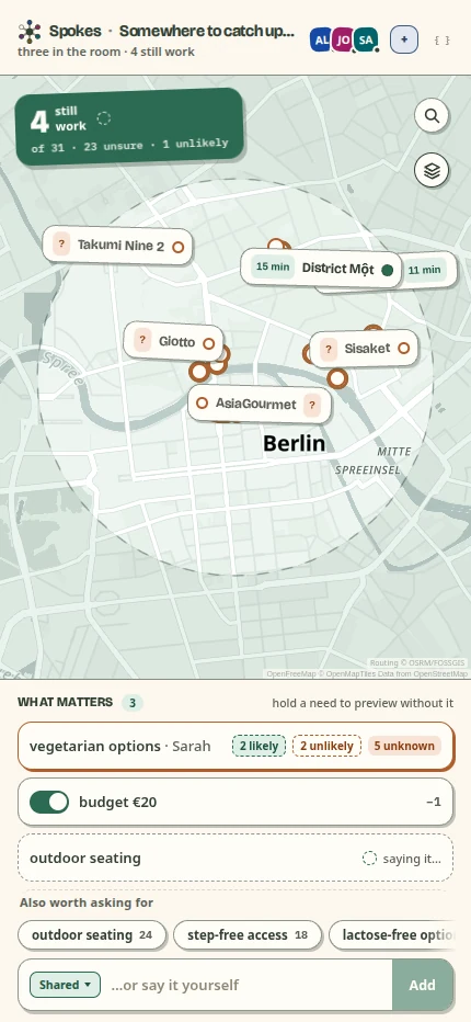 A need just stated: the row reads checking places and map dots wear a dashed ring while the lookup runs